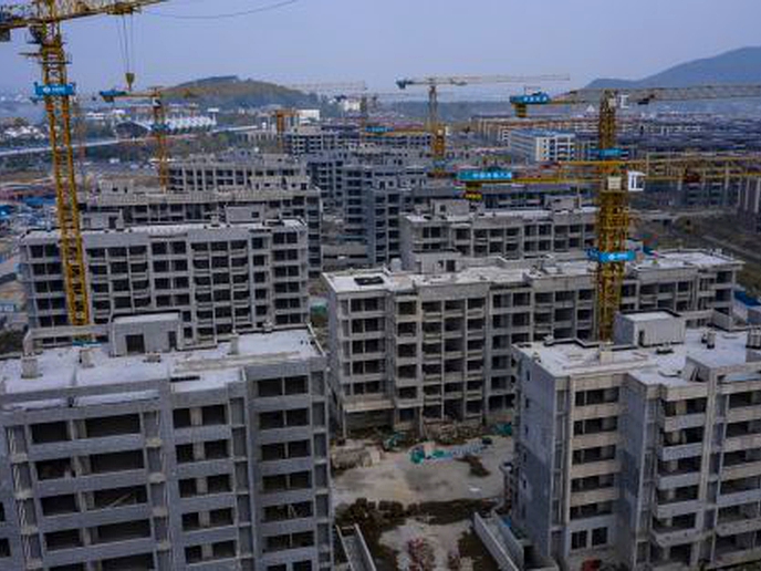 China seeks to stabilise property with loans, lower rates