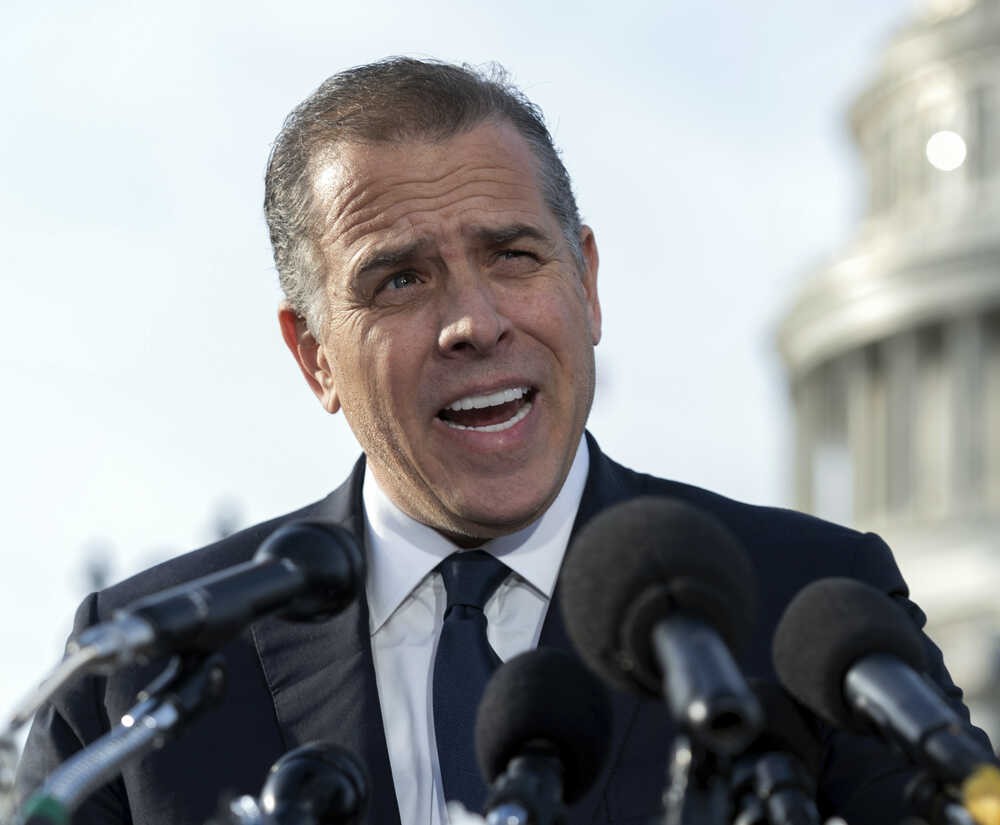 FBI informant charged with lying about Biden & son FBI informant charged with lying about Biden & son